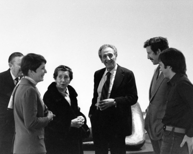 Photograph of Norton Simon in 1975 with friends and staff